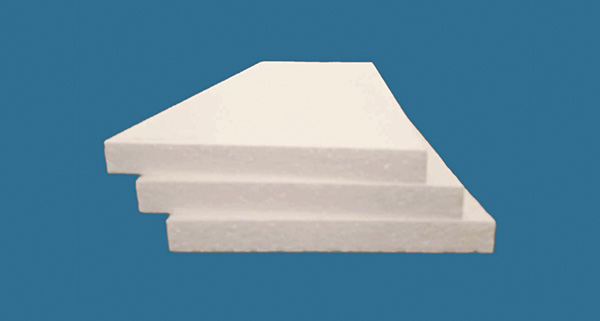 three white stacked triangular shapes against a blue background designed for display purposes